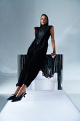 Load image into Gallery viewer, Black High-Neck Jumpsuit with Woven Leather Panel