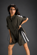 Load image into Gallery viewer, Dark Green Shirt Romper With Drawstring Waist, Black Details, And Metallic Side Panels
