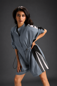 Load image into Gallery viewer, Cool Grey Shirt Romper With Drawstring Waist, Black Details, And Metallic Side Panels