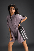 Load image into Gallery viewer, Ash Pink Shirt Romper With Drawstring Waist, Black Details, And Metallic Side Panels