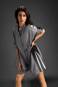 Load image into Gallery viewer, Warm Grey Shirt Romper With Drawstring Waist, Black Details, And Metallic Side Panels