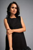 Load image into Gallery viewer, Sleeveless Black Mini Dress with Ruffled Shimmer Hemline