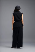 Load image into Gallery viewer, BLACK CO-ORD SET WITH NEON GEOMETRIC PANELLED SLEEVELESS BLAZER, TWISTED TOP AND TROUSERS