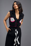 Load image into Gallery viewer, BLACK CO-ORD SET WITH NEON GEOMETRIC PANELLED SLEEVELESS BLAZER, TWISTED TOP AND TROUSERS