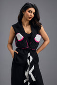 Load image into Gallery viewer, BLACK CO-ORD SET WITH NEON GEOMETRIC PANELLED SLEEVELESS BLAZER, TWISTED TOP AND TROUSERS