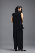 Load image into Gallery viewer, BLACK CO-ORD SET WITH NEON GEOMETRIC PANELLED SLEEVELESS BLAZER, TWISTED TOP AND TROUSERS