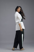Load image into Gallery viewer, BLACK CO-ORD SET WITH KNOTTED BUSTIER, OVERSIZED SHIRT AND SIDE-STRIPE TROUSERS