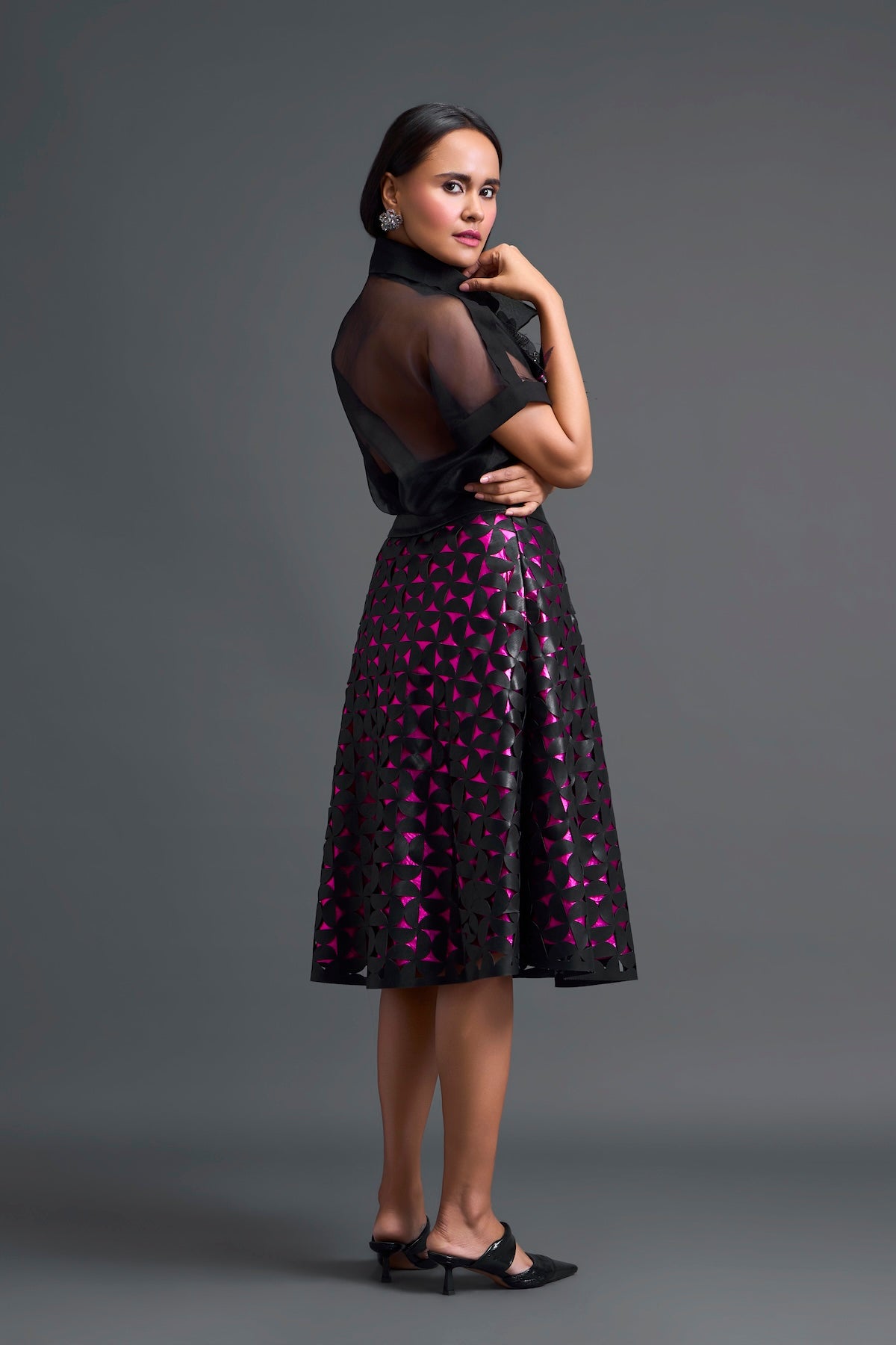 Black Halter Top and Geometric Laser-Cut Skirt Set