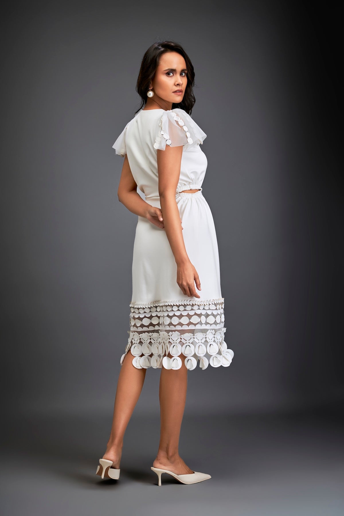 Dress With Sheer Sleeve Detailing And Mesh Geometric Appliqué Hemline