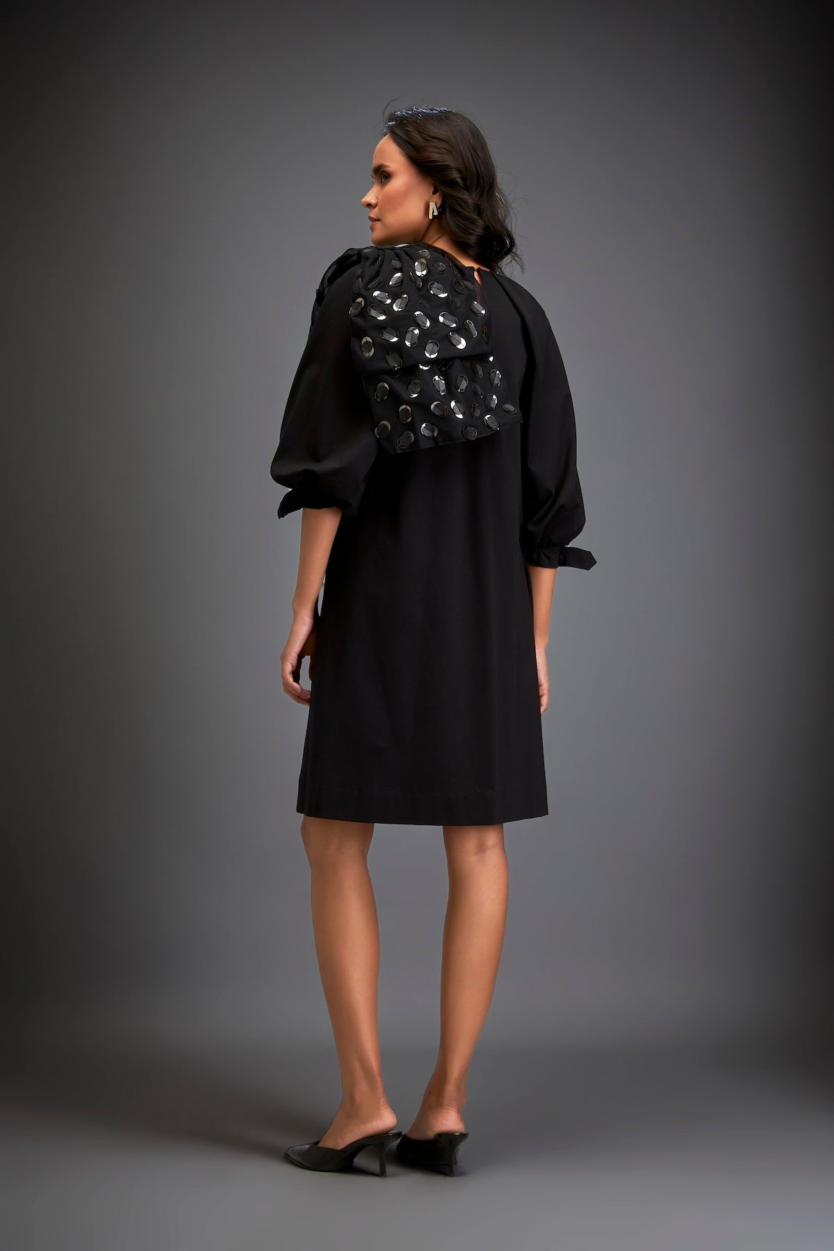 Dress With Voluminous Sleeves And Glossy Metallic Shoulder Embellishments