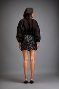 Load image into Gallery viewer, Blouse With Voluminous Sleeves And Textured Mini Skirt
