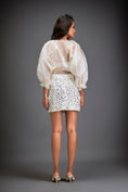 Load image into Gallery viewer, Blouse With Voluminous Sleeves And Textured Mini Skirt
