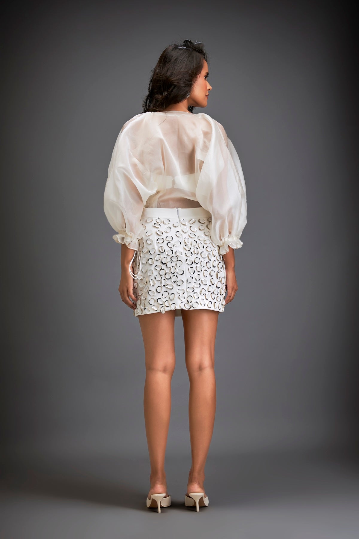 Blouse With Voluminous Sleeves And Textured Mini Skirt