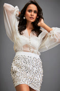 Load image into Gallery viewer, Blouse With Voluminous Sleeves And Textured Mini Skirt
