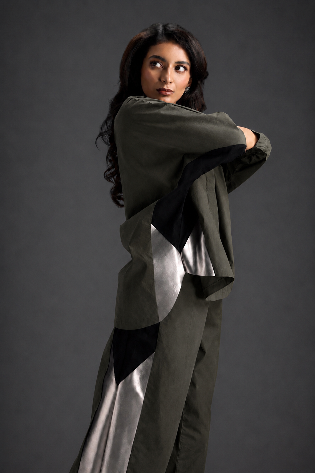 Relaxed Dark Green Co-ord With Loose-fit Dramatic-sleeve Shirt And Wide-leg Pants With Metallic Side Panels.