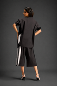 Load image into Gallery viewer, Relaxed Dark Brown Co-ord With Loose-fit Dramatic-sleeve Shirt And Wide-leg Pants With Metallic Side Panels.
