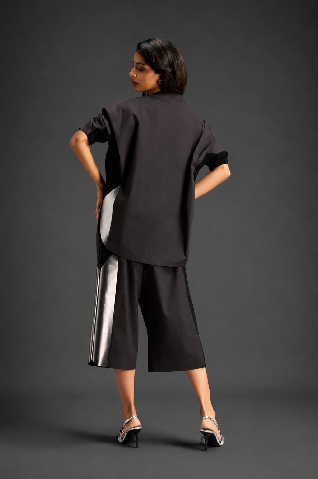 Relaxed Dark Brown Co-ord With Loose-fit Dramatic-sleeve Shirt And Wide-leg Pants With Metallic Side Panels.