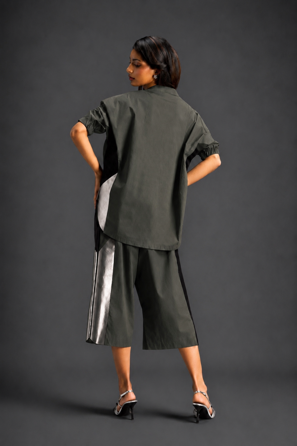 Relaxed Dark Green Co-ord With Loose-fit Dramatic-sleeve Shirt And Wide-leg Pants With Metallic Side Panels.