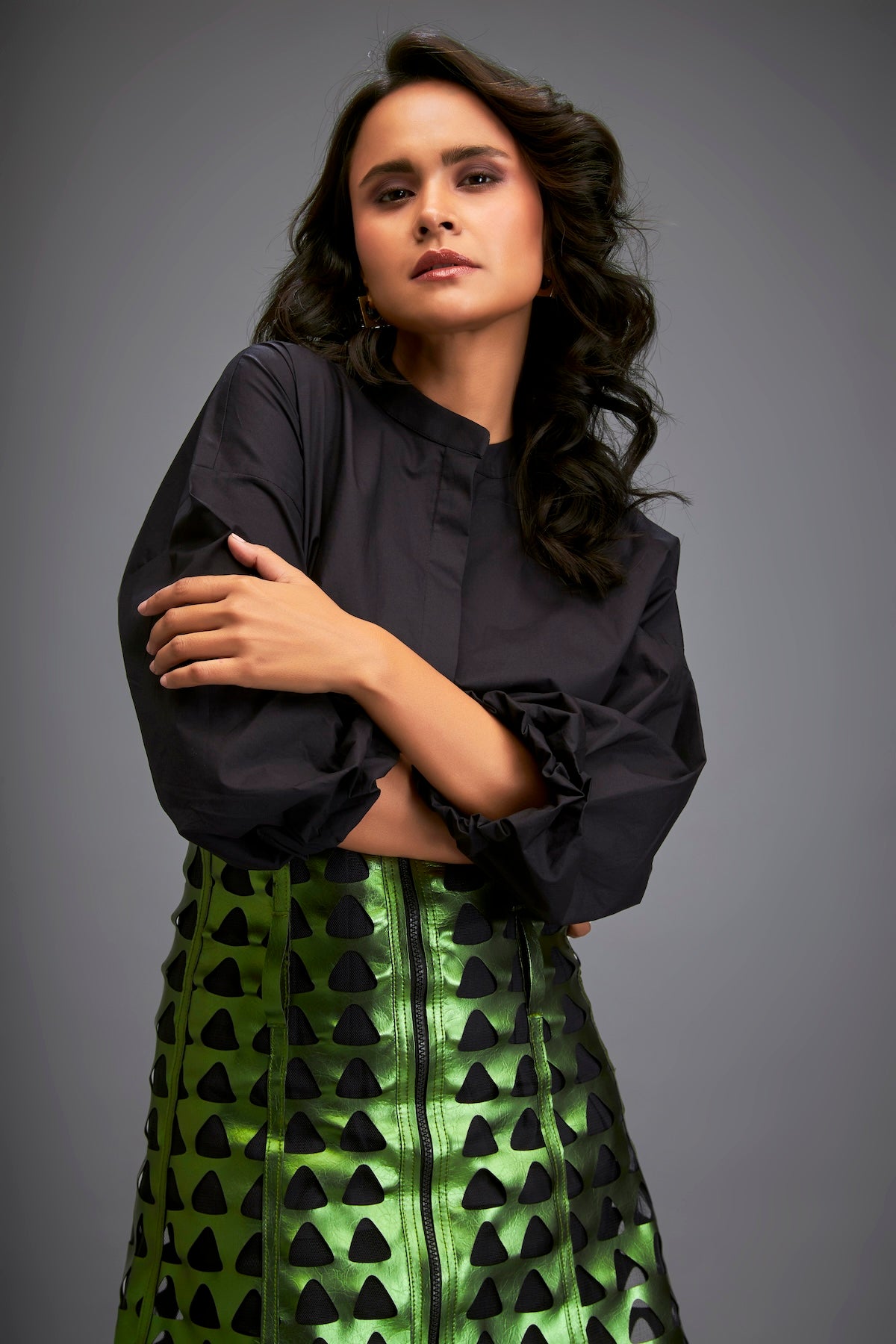 Shirt Paired With A Metallic Mini Skirt