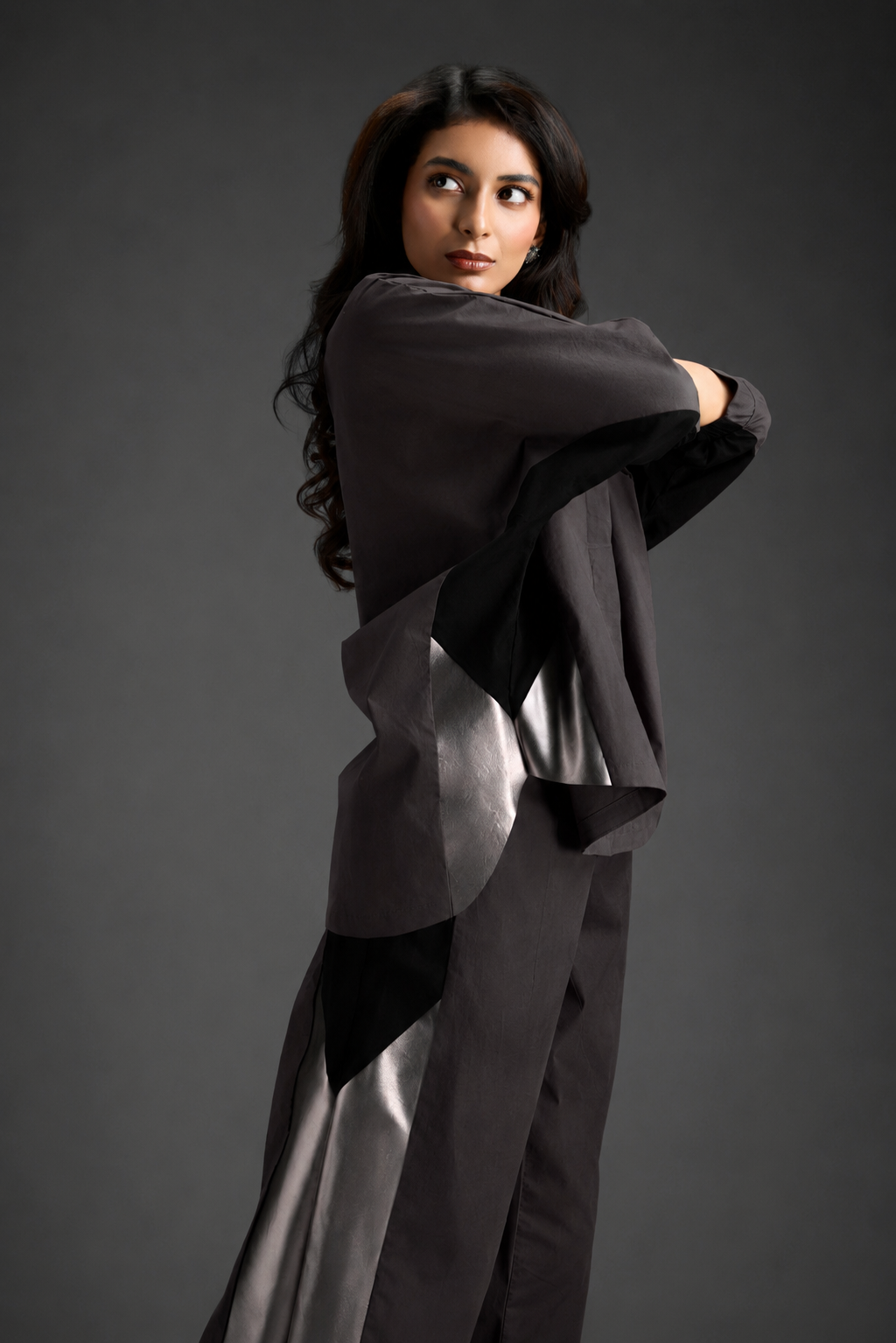 Relaxed Dark Brown Co-ord With Loose-fit Dramatic-sleeve Shirt And Wide-leg Pants With Metallic Side Panels.