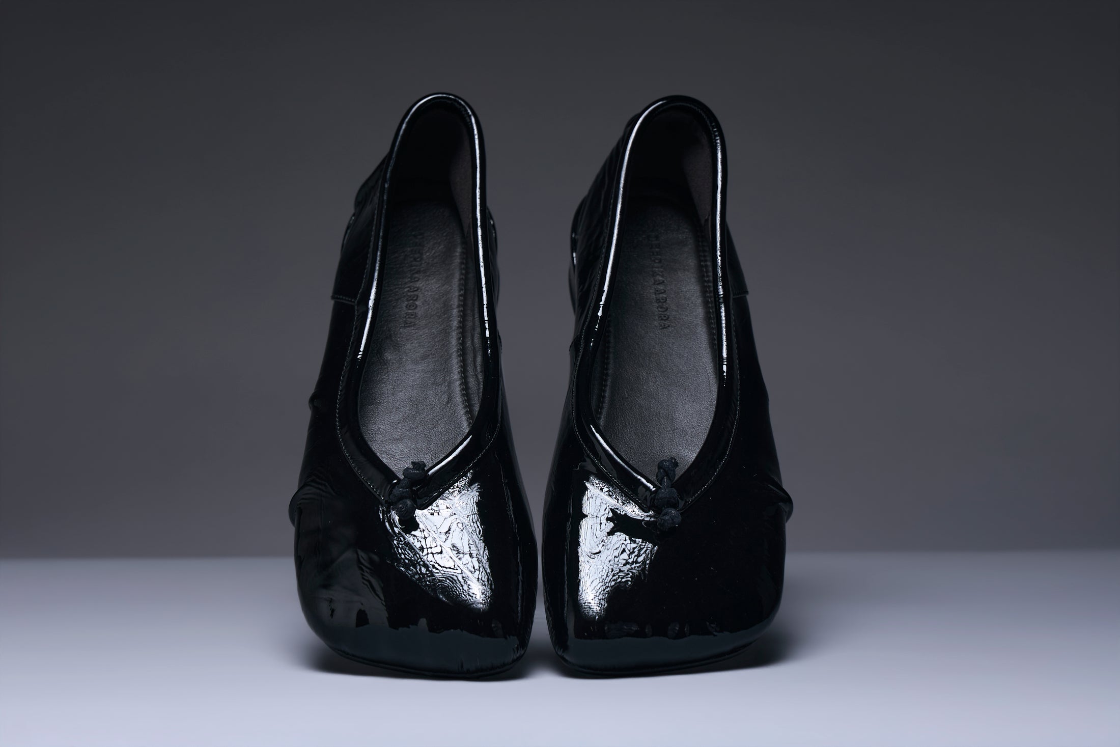 Onyx Gloss Bow Mules
