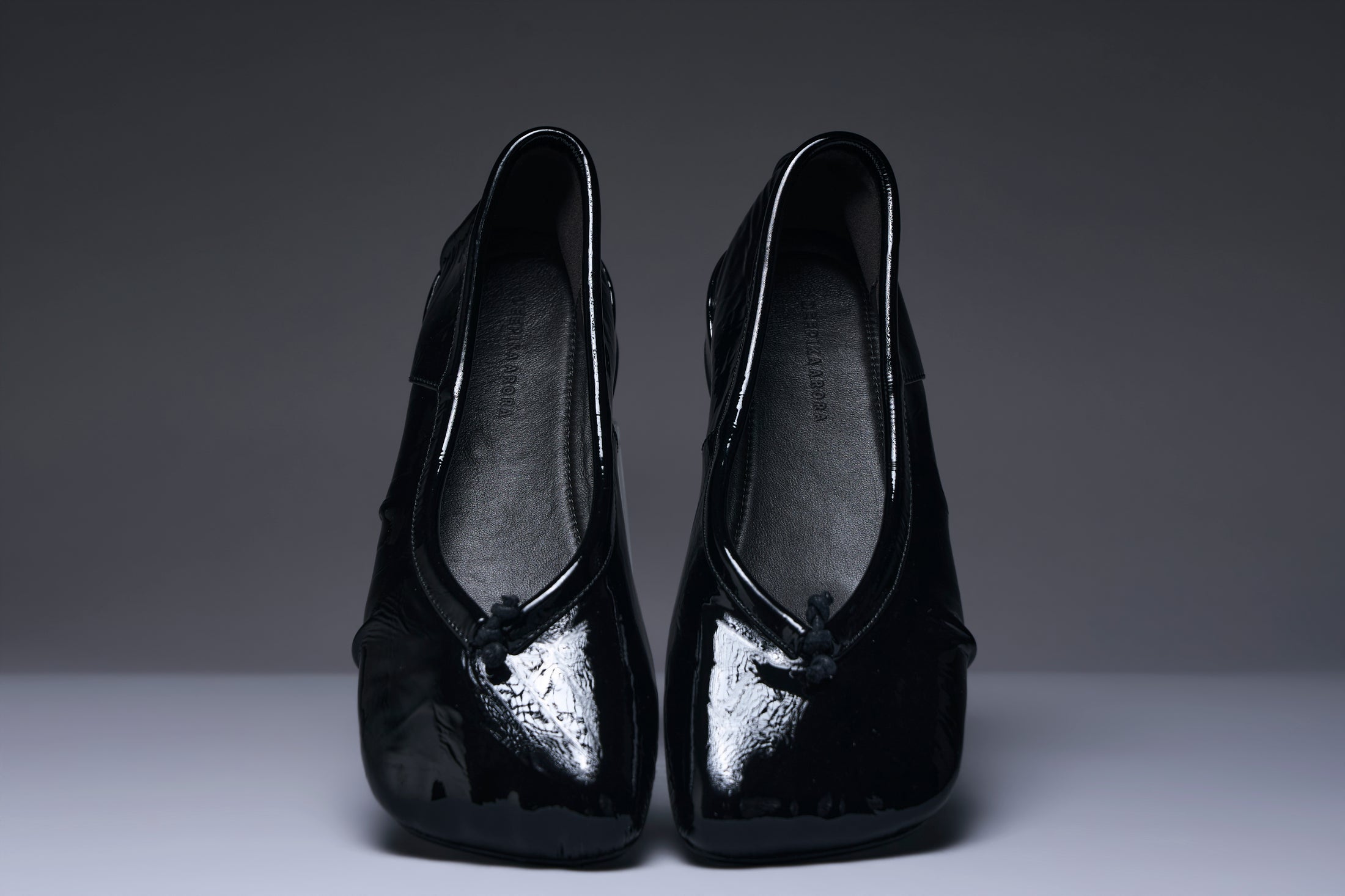 Onyx Gloss Bow Mules