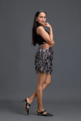 Load image into Gallery viewer, Black Twist Crop Top and Metallic Floral Mini Skirt
