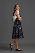 Load image into Gallery viewer, Sheer Floral Top and Black Laser-Cut Skirt Set
