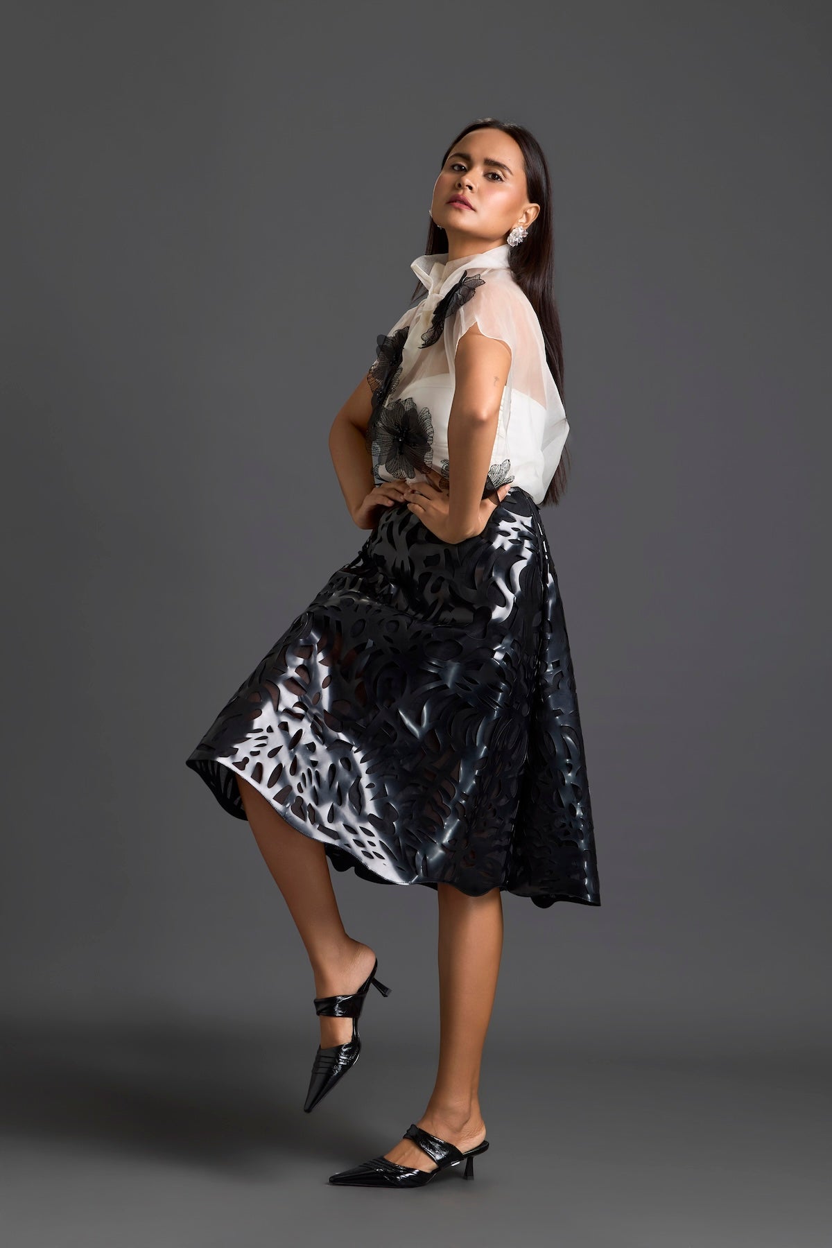 Sheer Floral Top and Black Laser-Cut Skirt Set