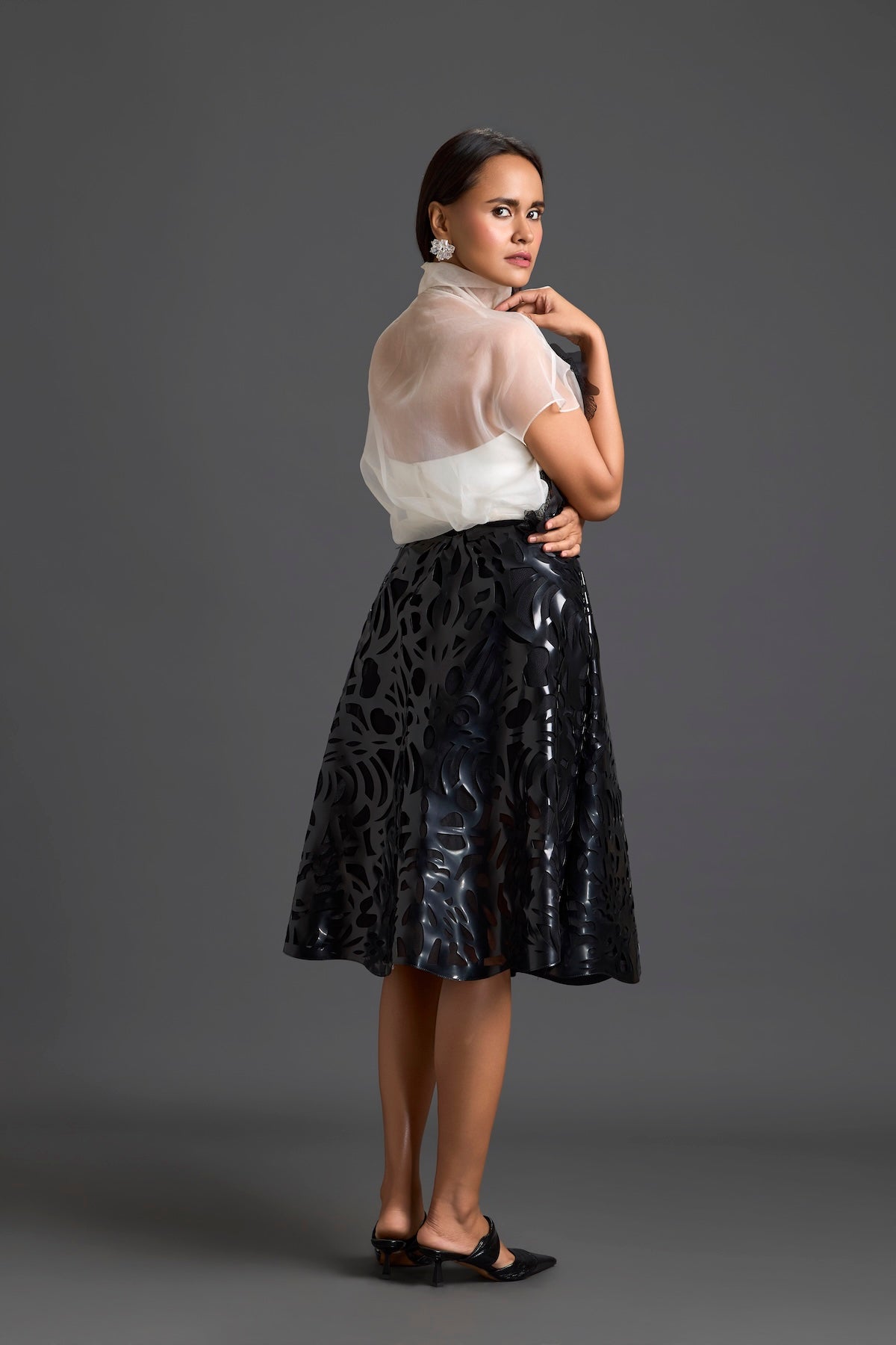 Sheer Floral Top and Black Laser-Cut Skirt Set
