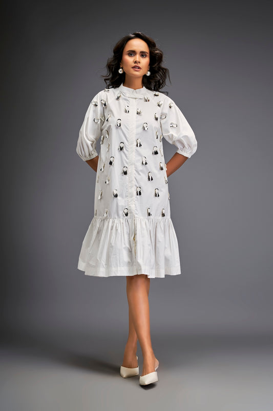 Dress With Puff Sleeves And Glossy Metallic Discs And A Ruffled Hemline