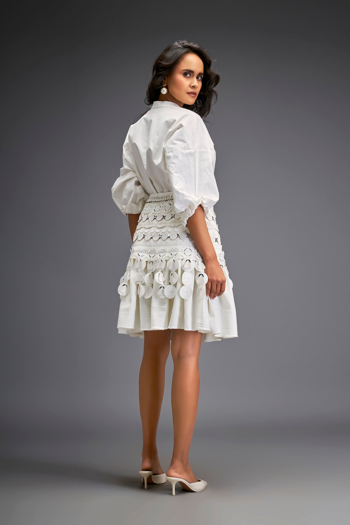 White Sleeve Blouse With A Textured Waistline And Tiered Skirt