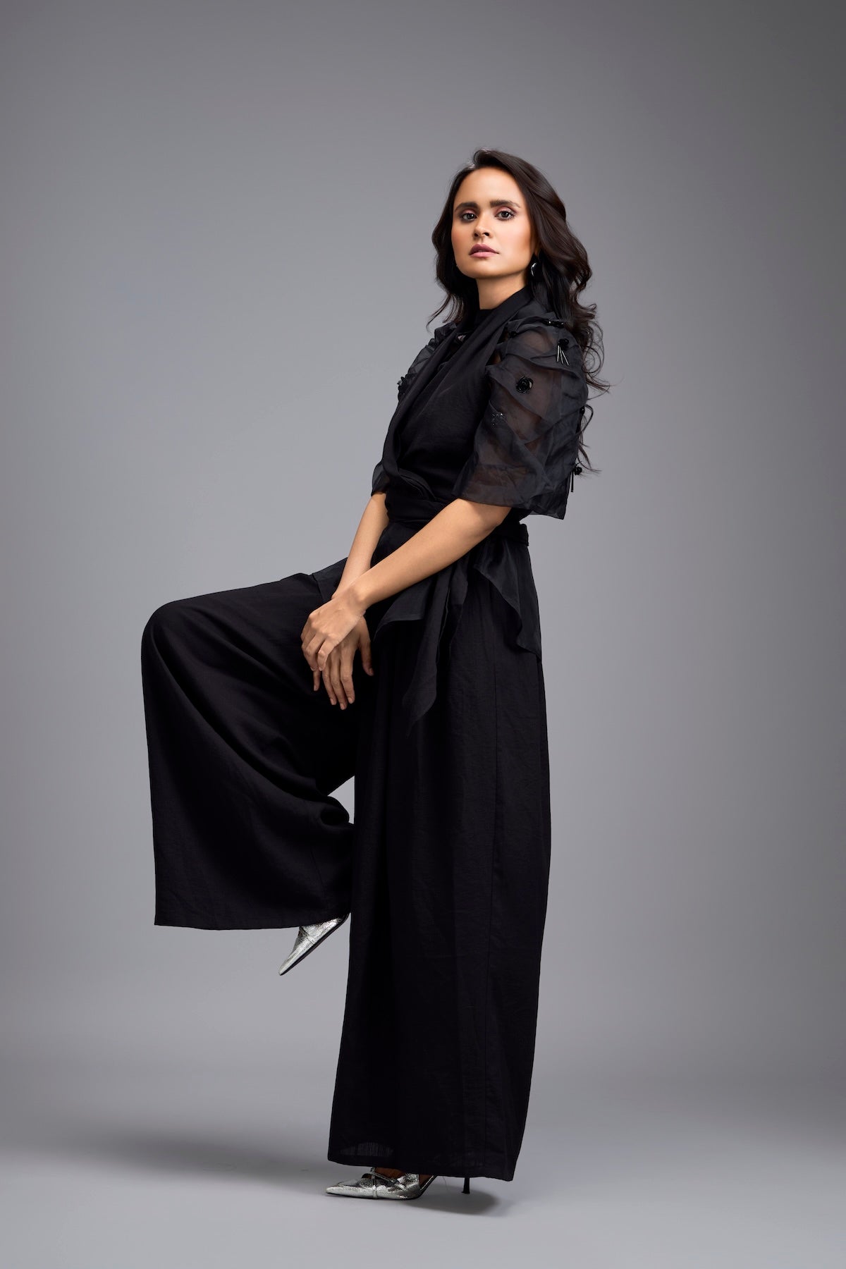 Black High-Neck Blouse with Floral Sleeves & Wide-Leg Trousers