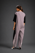 Load image into Gallery viewer, Colorblock Jumpsuit In Ash Pink , Black & Metallic Panels With Relaxed Fit
