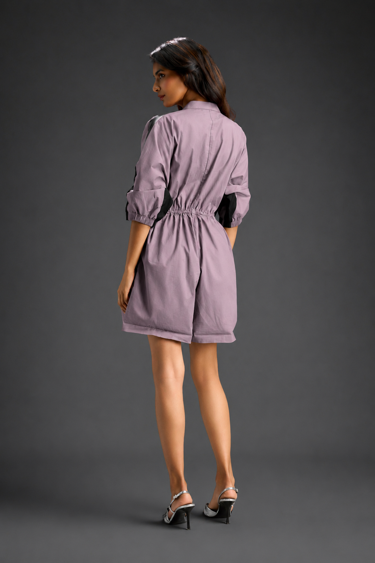 Ash Pink Shirt Romper With Drawstring Waist, Black Details, And Metallic Side Panels