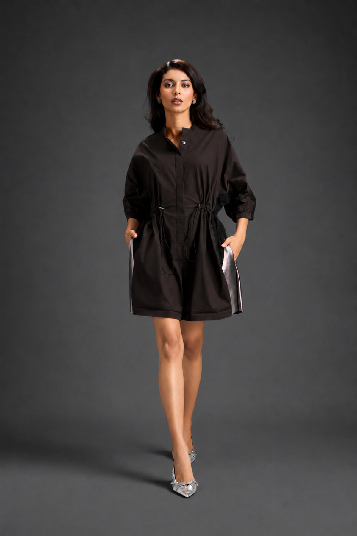 Dark Brown Shirt Romper With Drawstring Waist, Black Details, And Metallic Side Panels