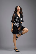 Load image into Gallery viewer, Black Sequin Playsuit with Sheer Sleeves
