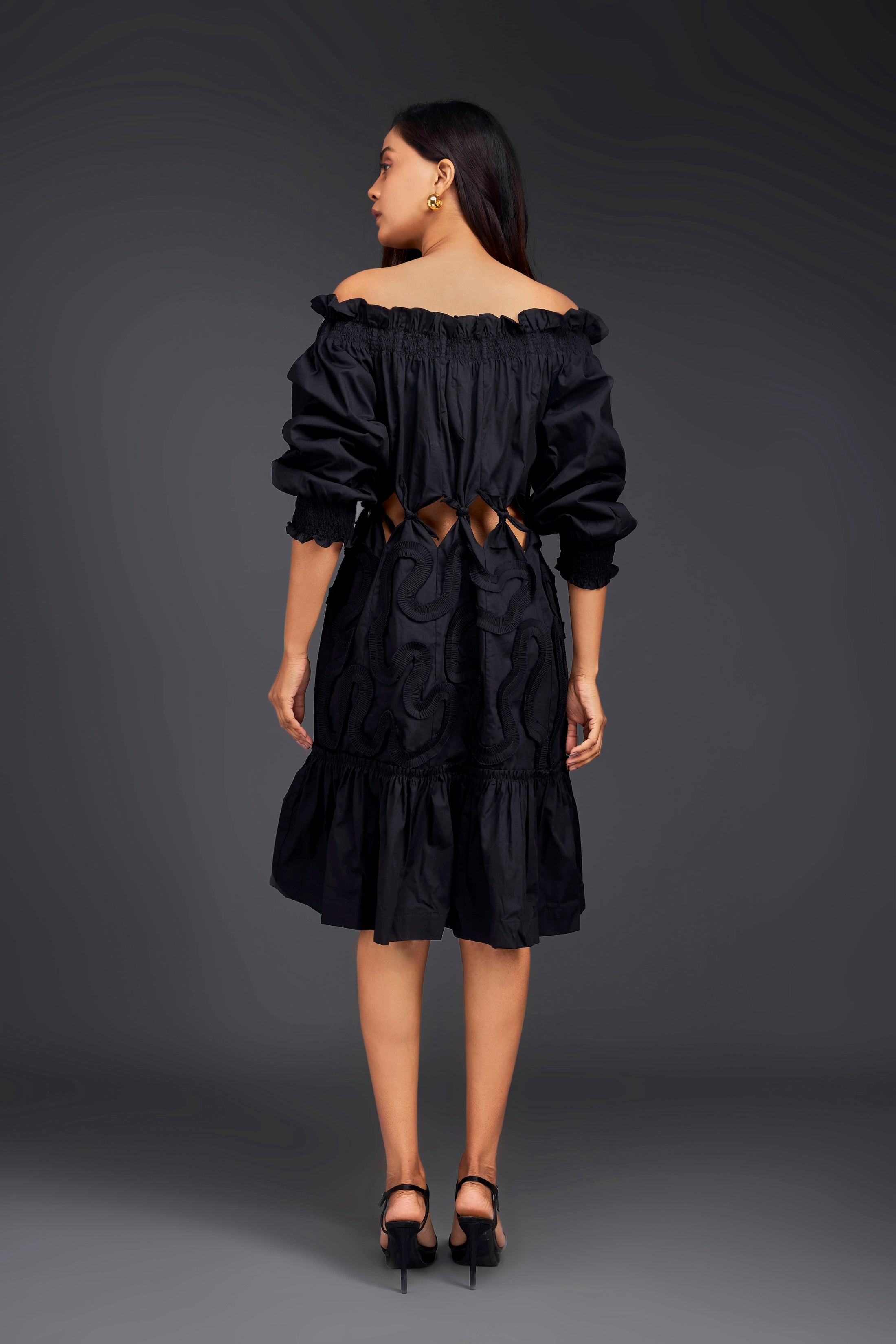 Black Off-shoulder Dress With Waist Cutouts And Pleated Frill Detailing