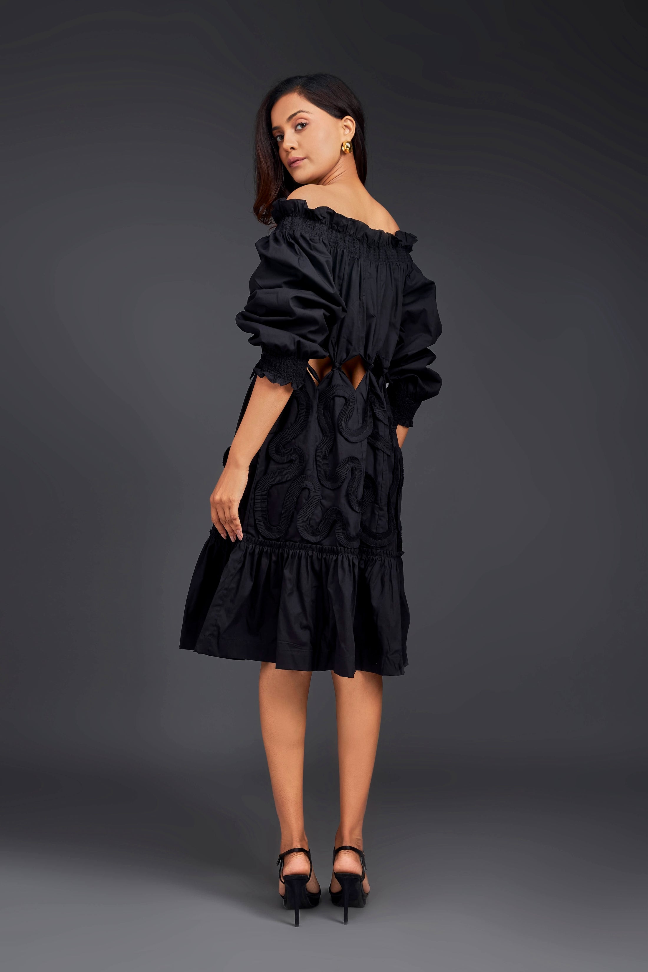 Black Off-shoulder Dress With Waist Cutouts And Pleated Frill Detailing