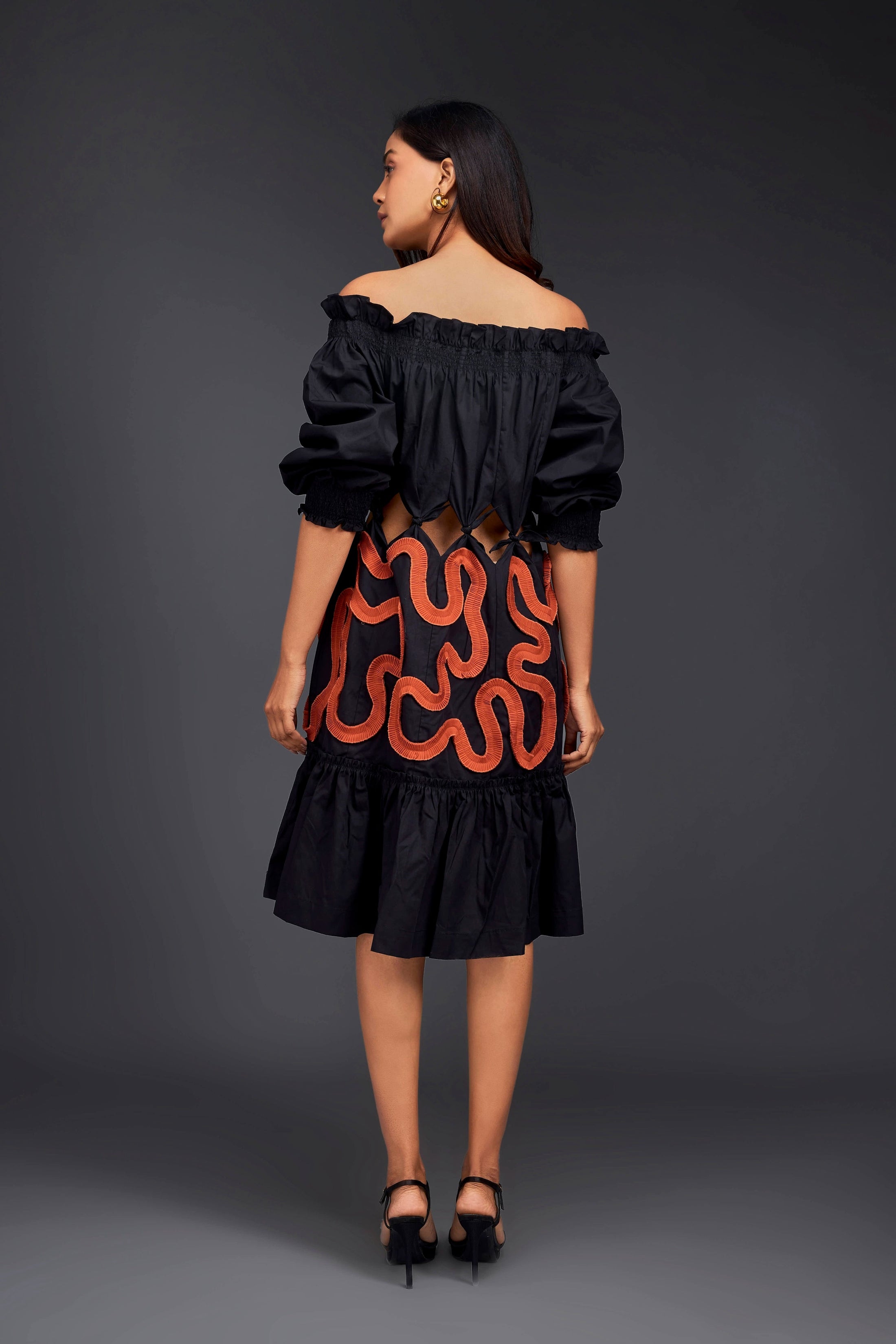 Black Off-Shoulder Dress With Waist Cutouts And Pleated Frill Detailing