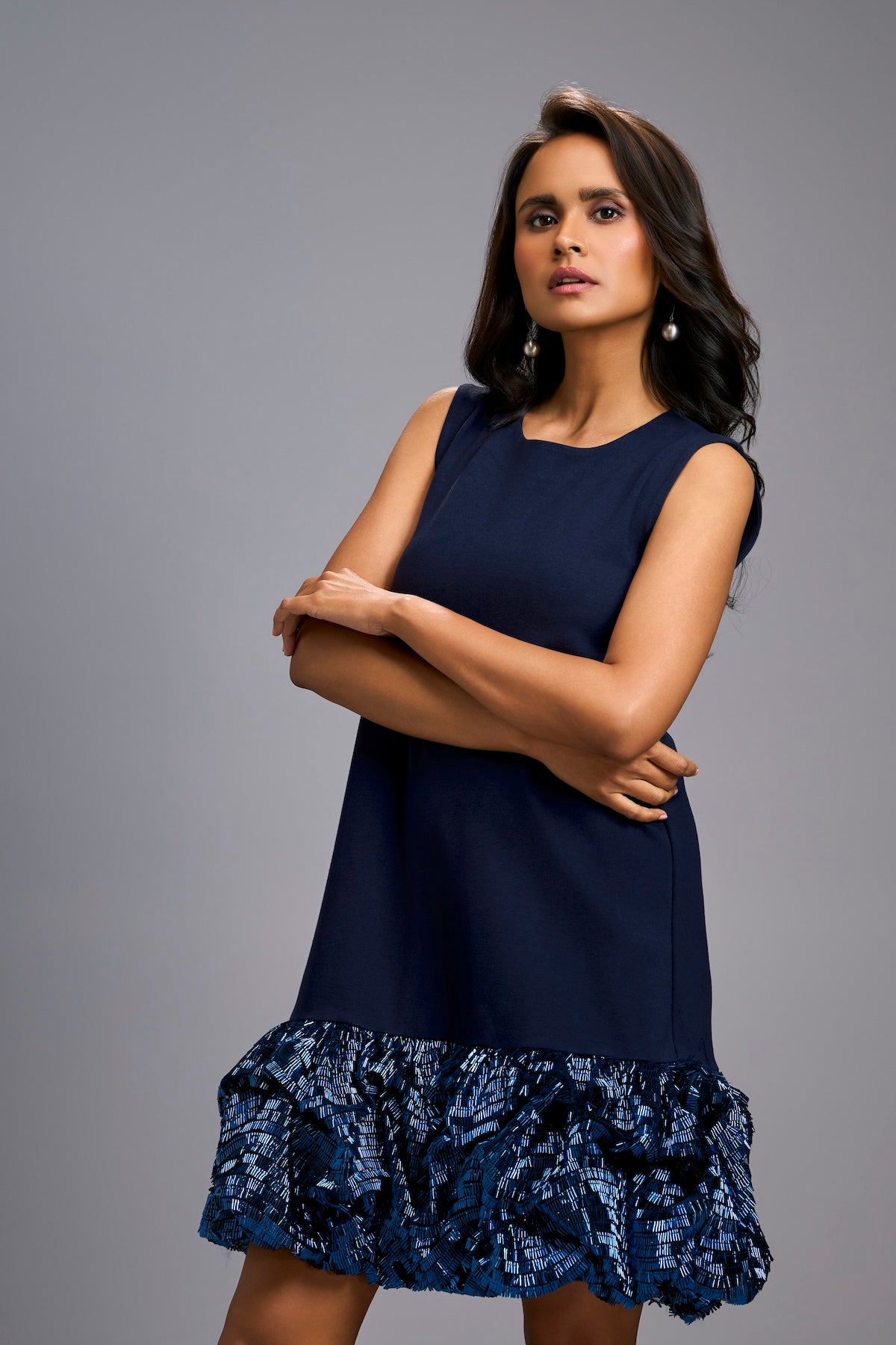 Sleeveless Navy Blue Mini Dress with Ruffled Shimmer Hemline