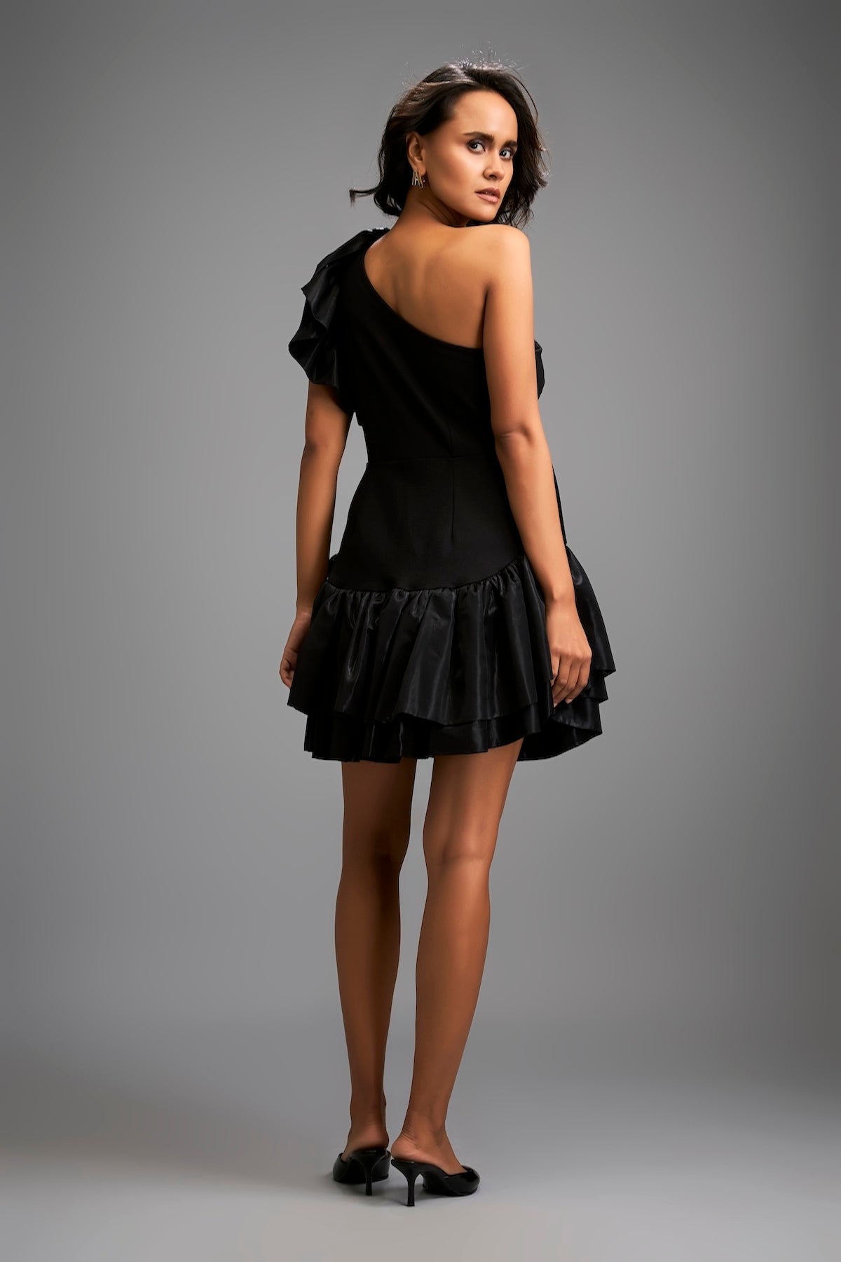 Asymmetrical Black Mini Dress with Dramatic Ruffles and Tiered Skirt