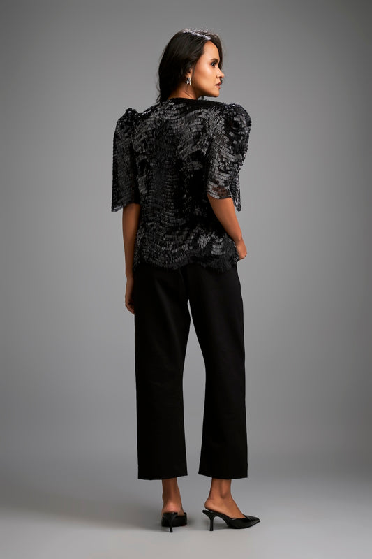 Textured Black Shimmer Top with Sculptural Shoulders and Cropped Pants