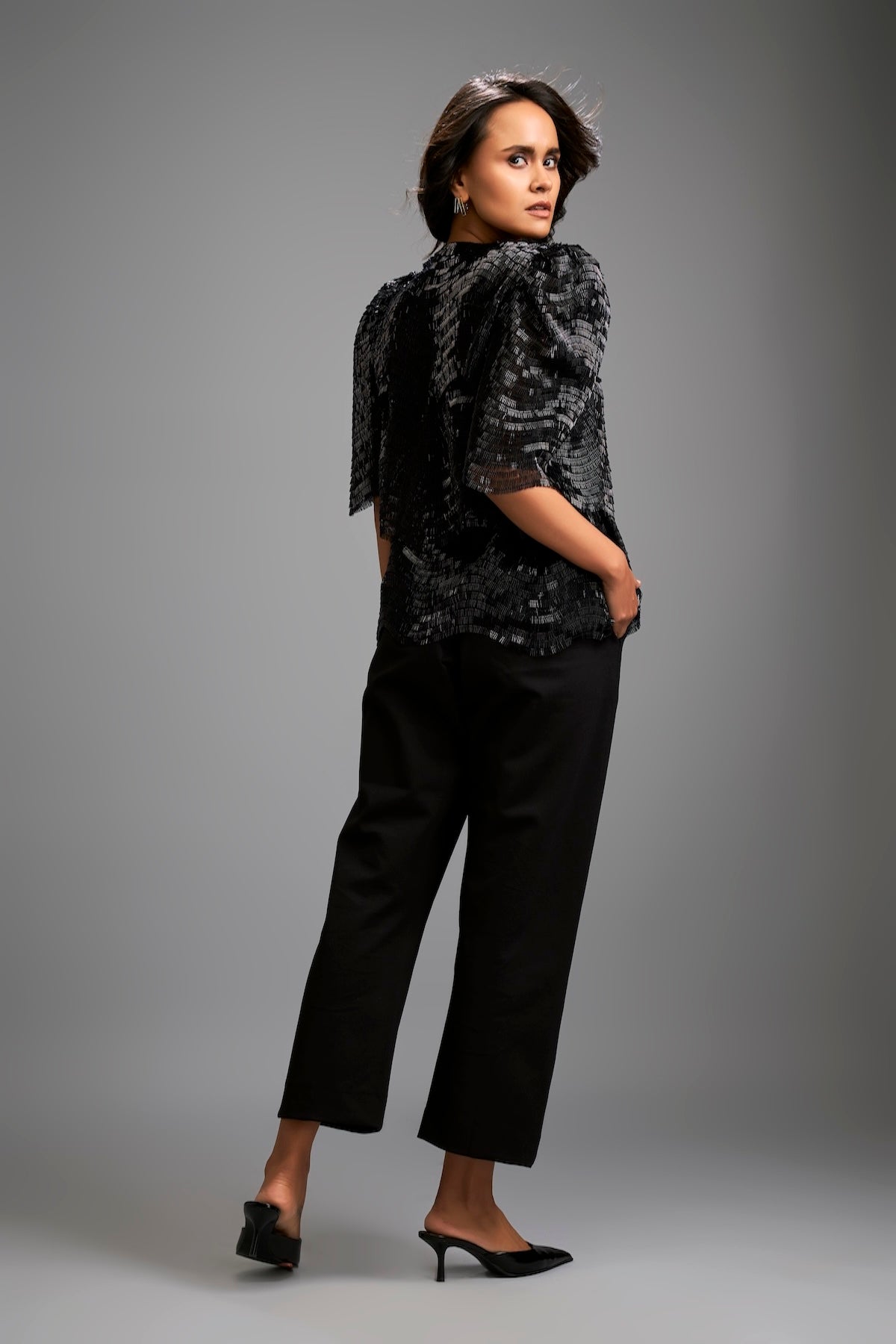 Textured Black Shimmer Top with Sculptural Shoulder Detailing