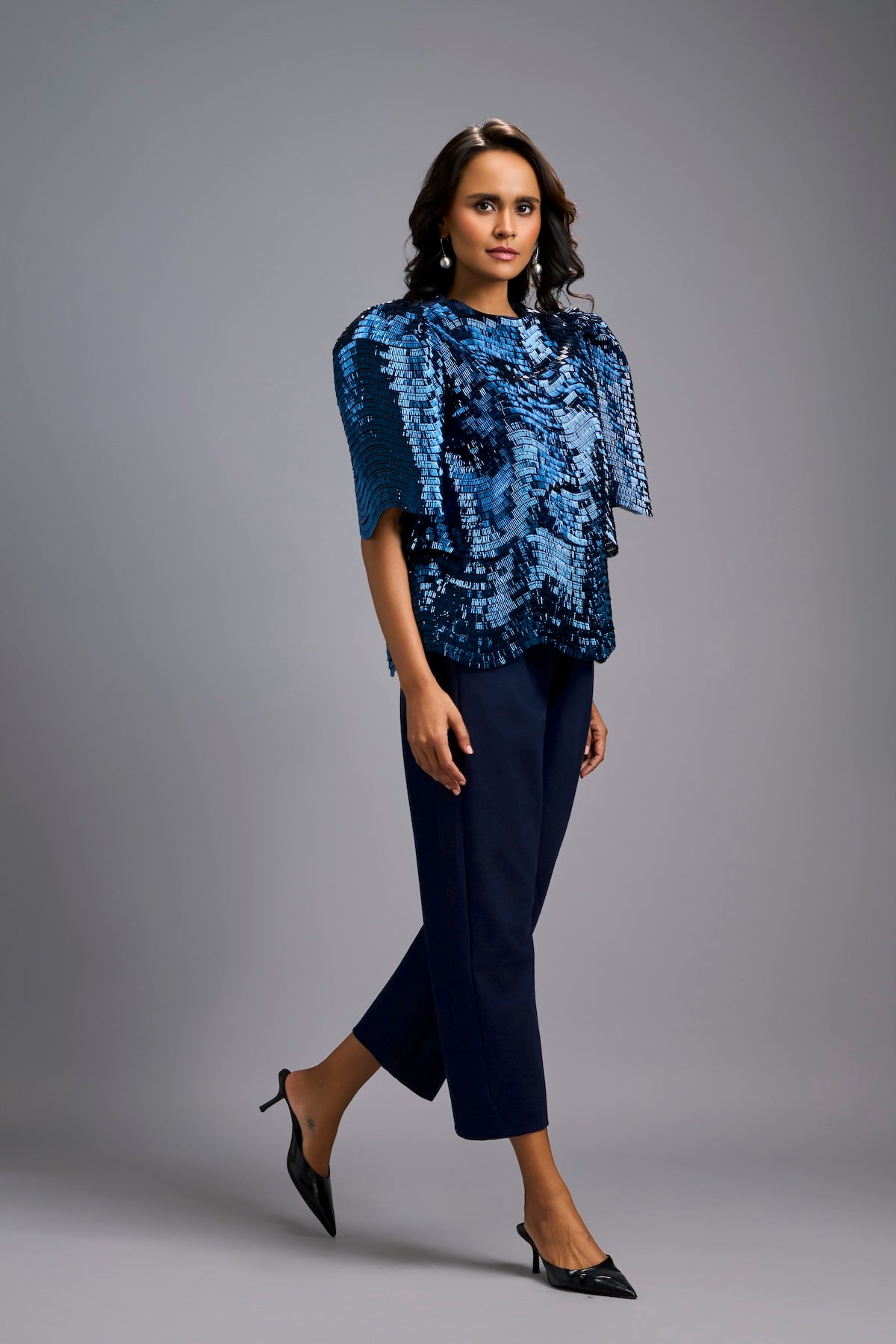 Textured Navy Blue Shimmer Top with Sculptural Shoulders and Cropped Pants