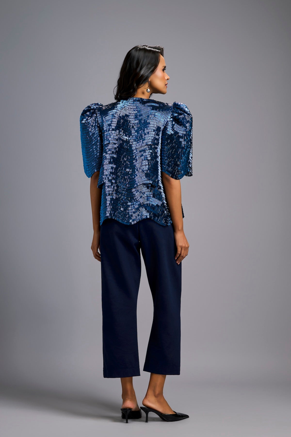 Textured Navy Blue Shimmer Top with Sculptural Shoulders and Cropped Pants