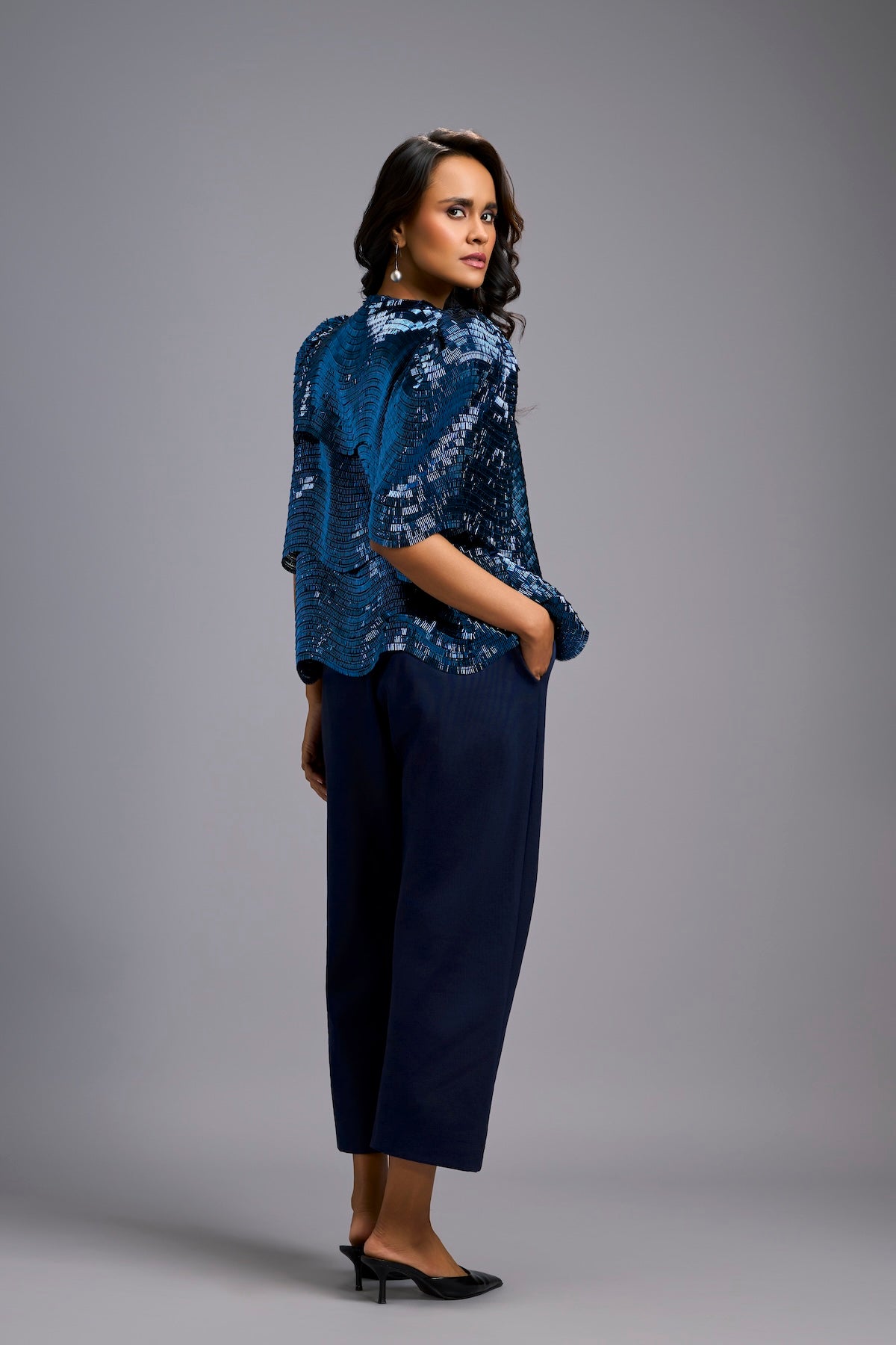 Textured Navy Blue Shimmer Top with Sculptural Shoulders and Cropped Pants