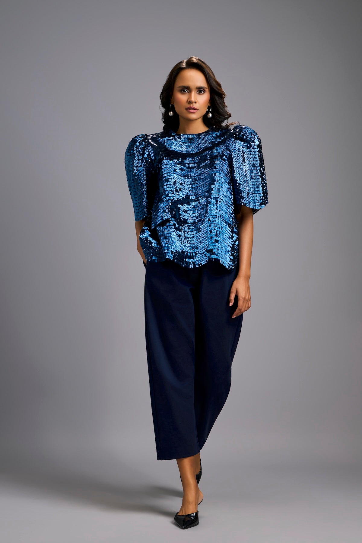 Textured Navy Blue Shimmer Top with Sculptural Shoulders and Cropped Pants