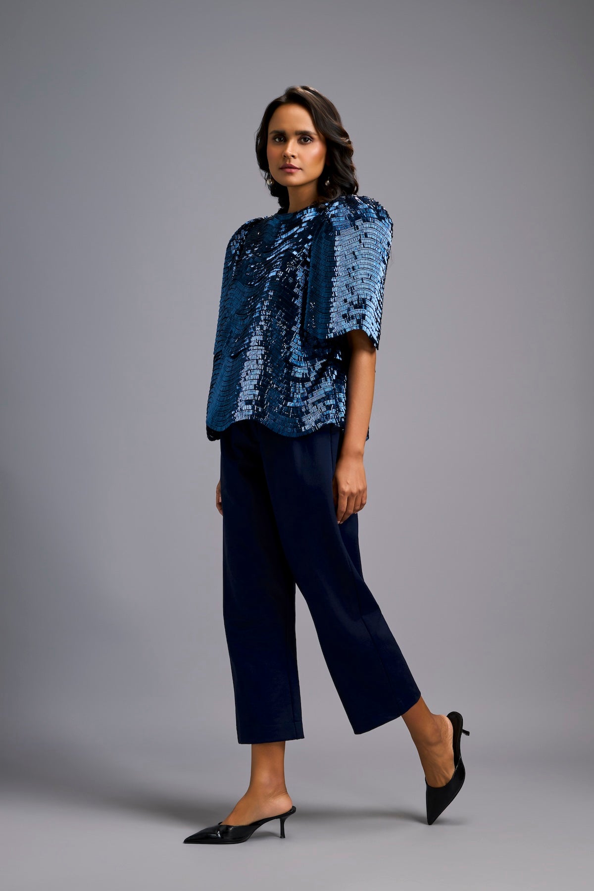 Textured Navy Blue Shimmer Top with Sculptural Shoulders and Cropped Pants