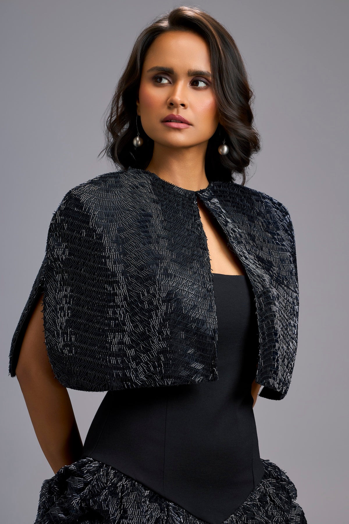 Strapless Black Dress with Voluminous Shimmer Skirt & Cape